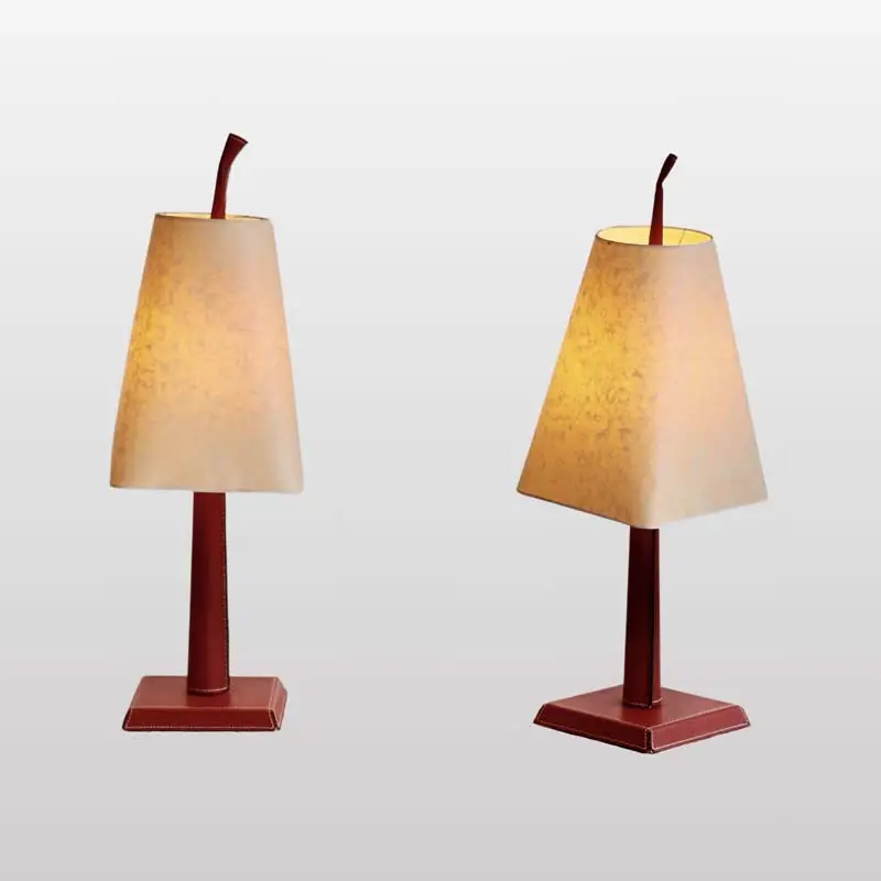 A pair of lamps by Hugues Chevalier, France 80s.